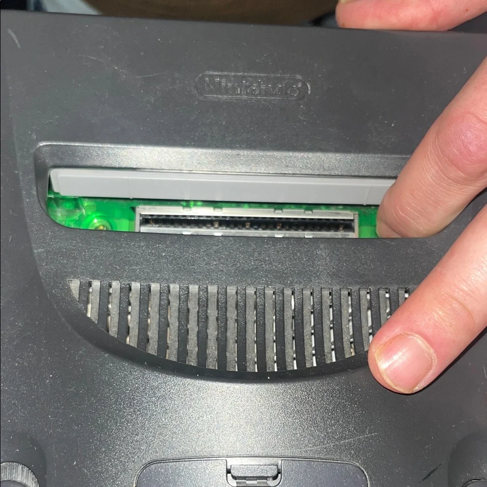 Nintendo 64 Console with Atomic Clear and Green Controllers (authentic)